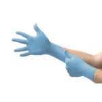 Blue Nitrile Exam Glove on Hand